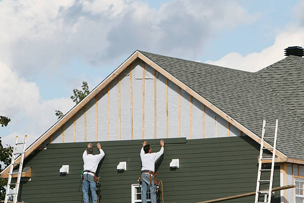Professional Emergency Siding Repair technician working in Owensville, IN
